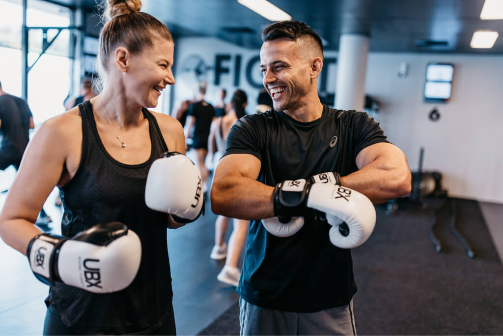 Group of people training at gym